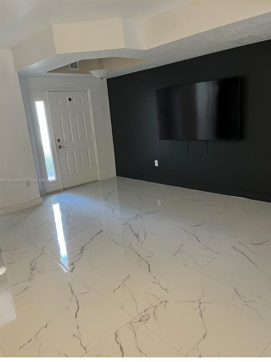 10150 Southwest 88th Street, Unit 103 Miami, FL 33176 - Photo 8 of 29 a view of entryway