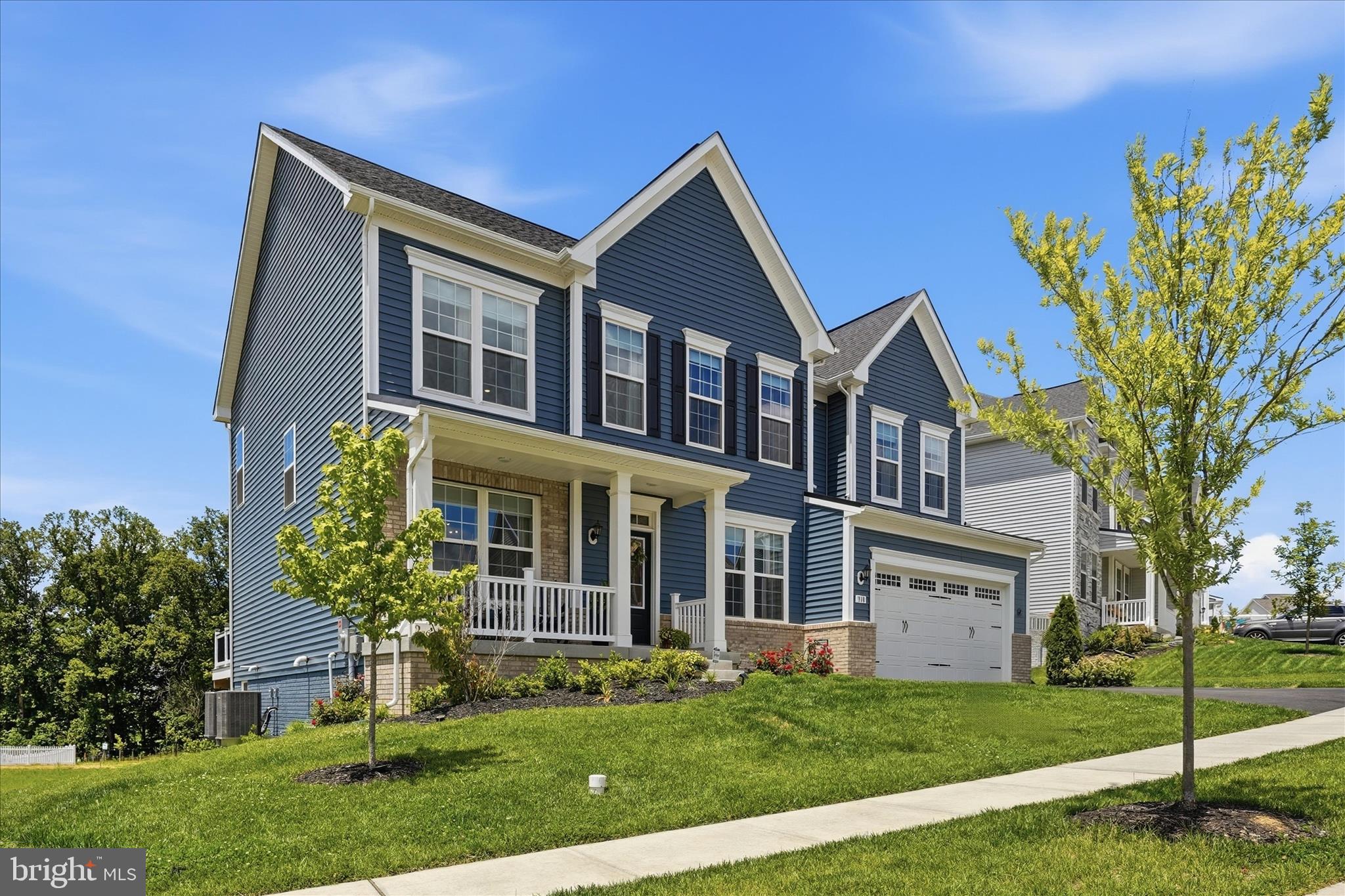 910 Enfield Farm Lane Brunswick, MD 21716 - Photo 58 of 87 a front view of a house with a yard
