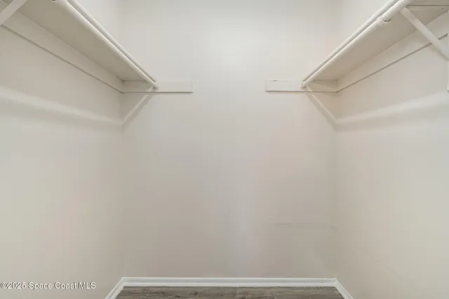 a view of small space with racks on the wall