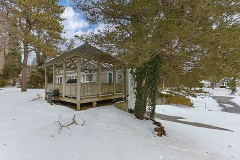 a view of backyard space and deck