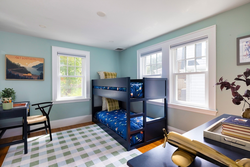 18 Wolcott Road Brookline, MA 02467 - Photo 13 of 19 a living room with furniture and a window