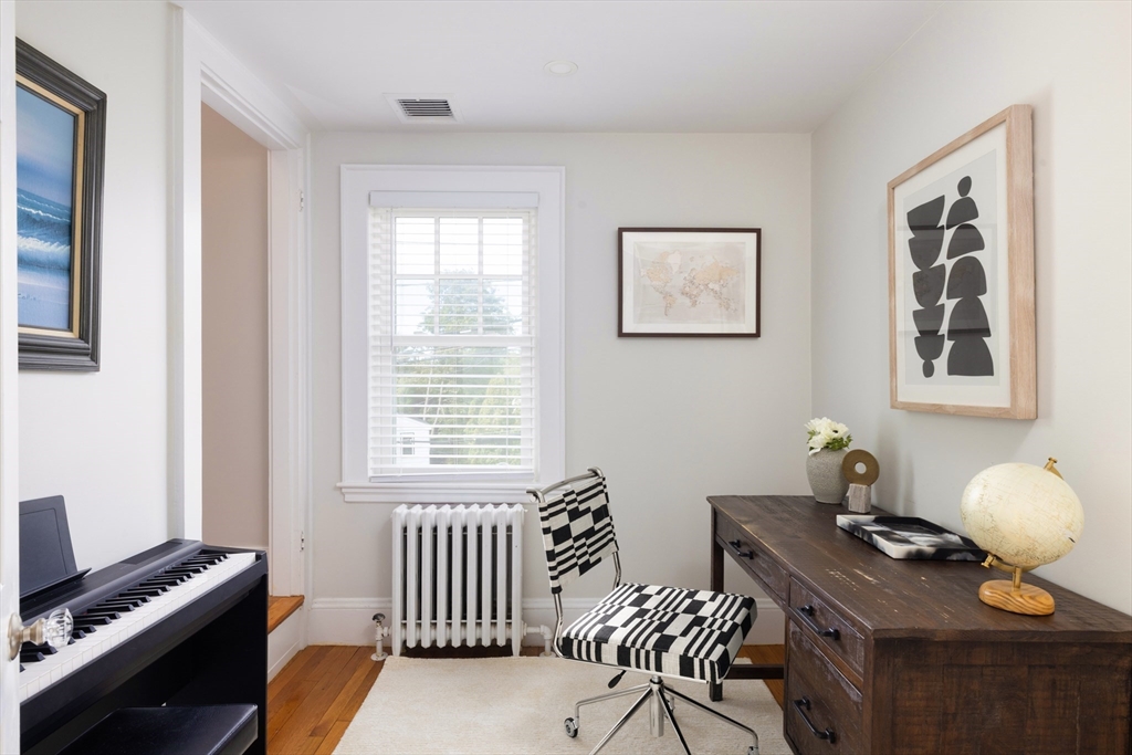 18 Wolcott Road Brookline, MA 02467 - Photo 14 of 19 a bedroom with a workspace