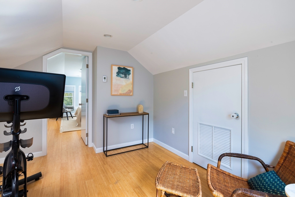 18 Wolcott Road Brookline, MA 02467 - Photo 16 of 19 a living room with furniture and a flat screen tv
