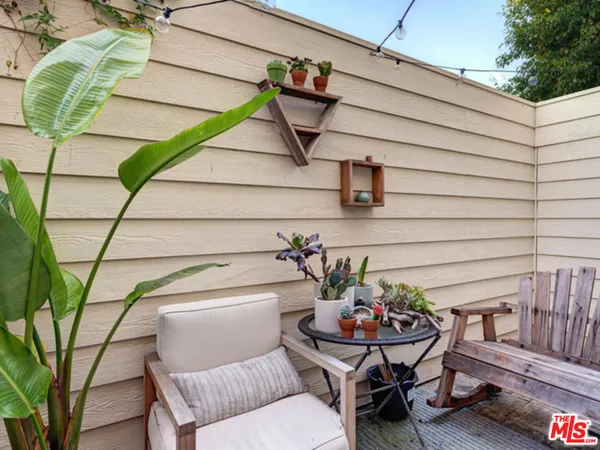 a view of a chairs in patio