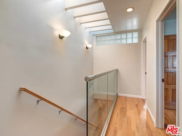 a very nice looking room with wooden floor