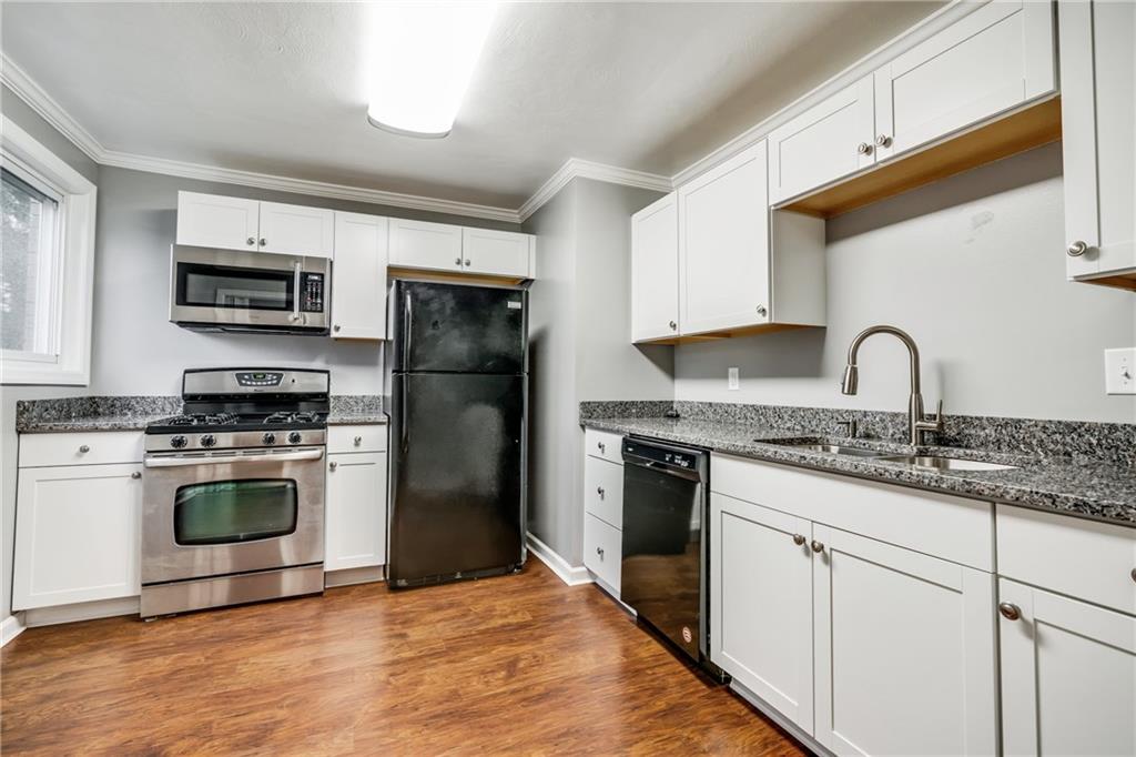 281 Ewings Mill Road Coraopolis, PA 15108 - Photo 6 of 25 Brand new cabinets and granite counter tops.