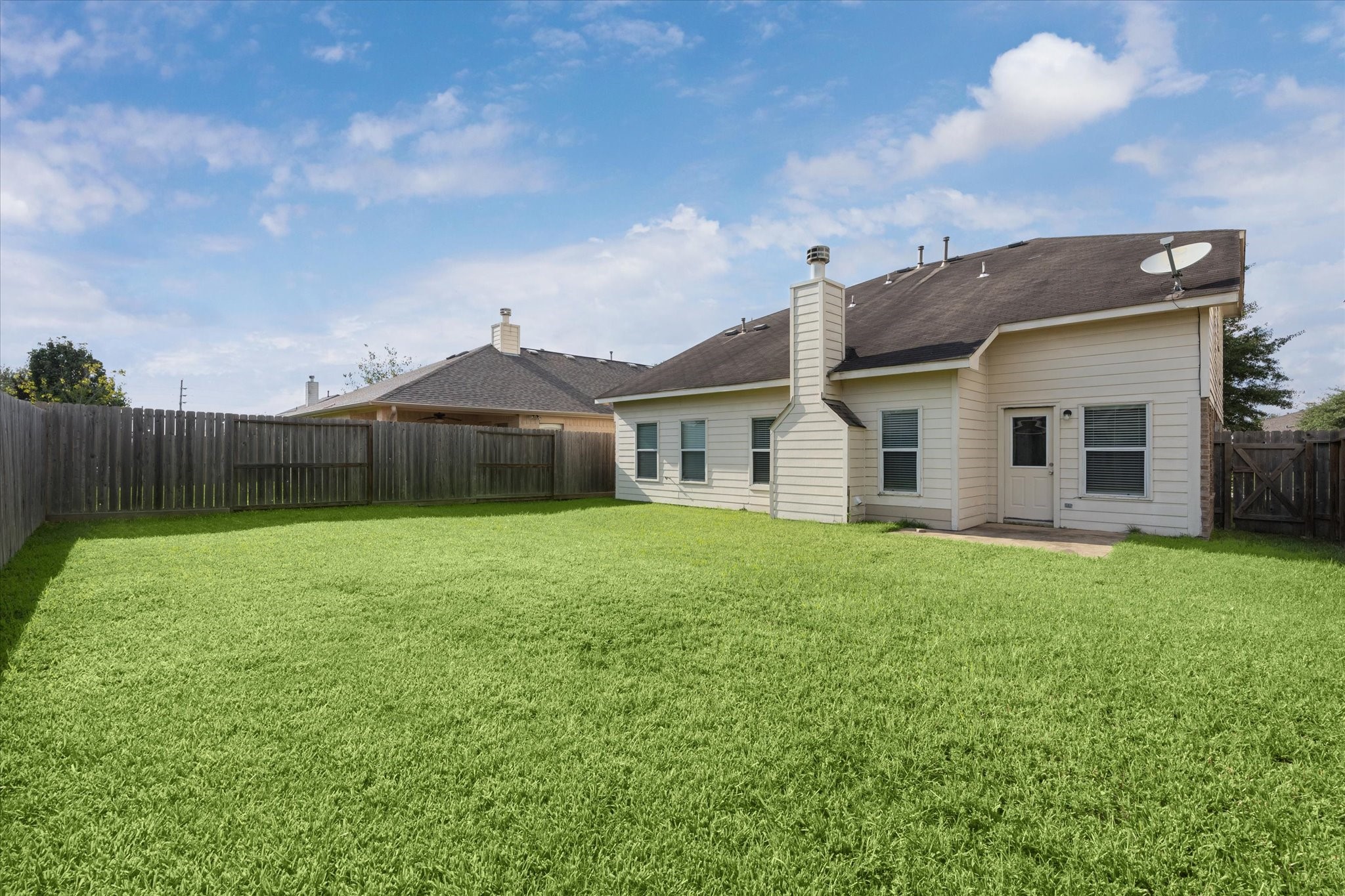18239 Eton Ridge Court Richmond, TX 77407 - Photo 10 of 10 a front view of a house with garden