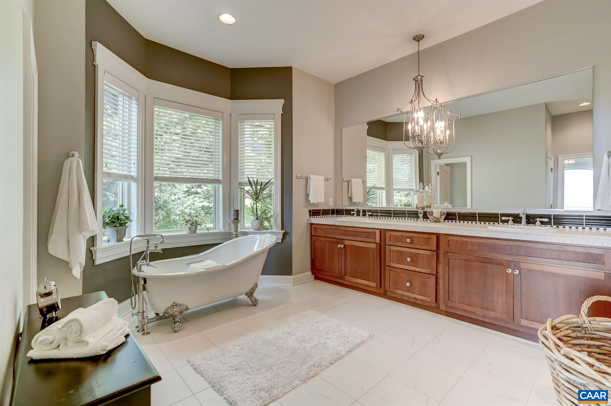 2545 Summit Ridge Trail Charlottesville, VA 22911 - Photo 28 of 47 a large spacious bathroom with a large tub and sink