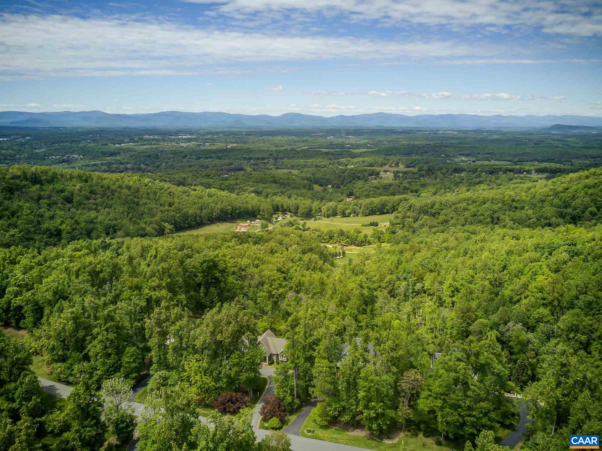 2545 Summit Ridge Trail Charlottesville, VA 22911 - Photo 5 of 47 a view of an ocean and a yard