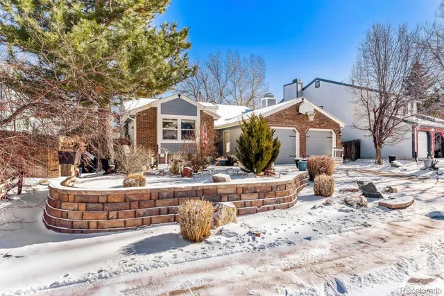 a large tub sitting in front of a house