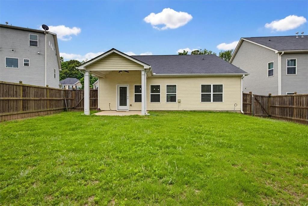 314 Boulder Run Hiram, GA 30141 - Photo 29 of 31 a view of a house with a yard and table