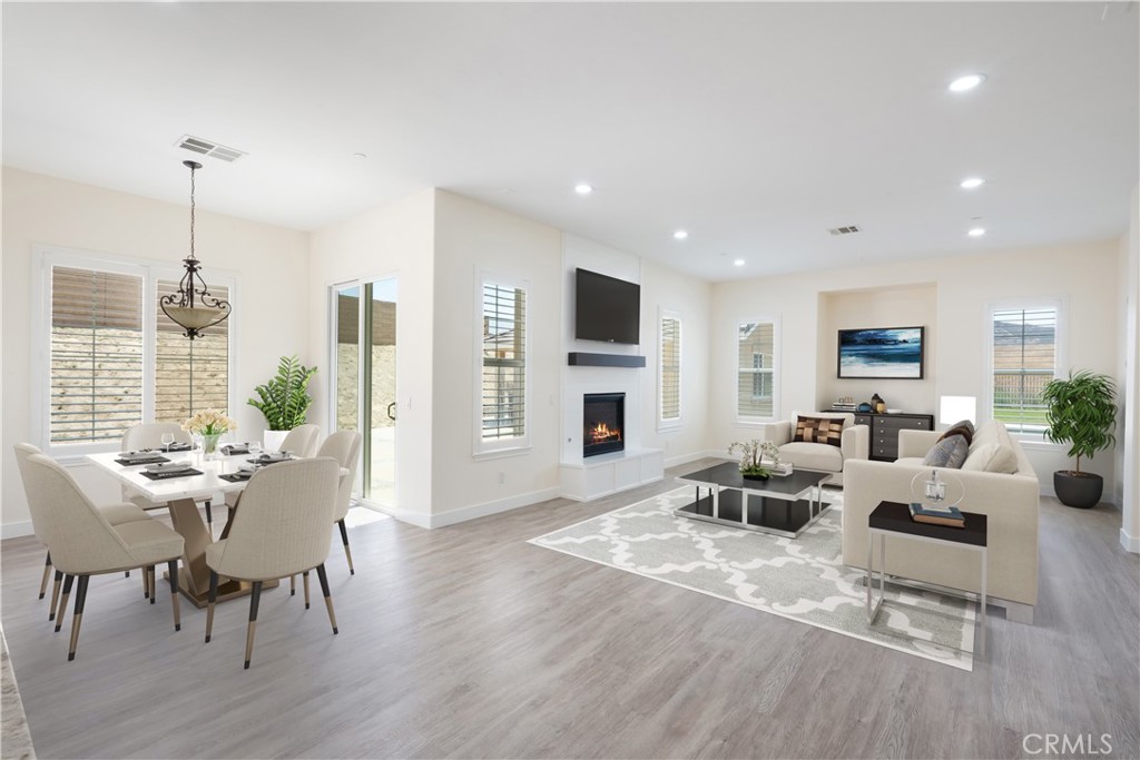 Virtually Staged - Main House - Family Room and Eating Area