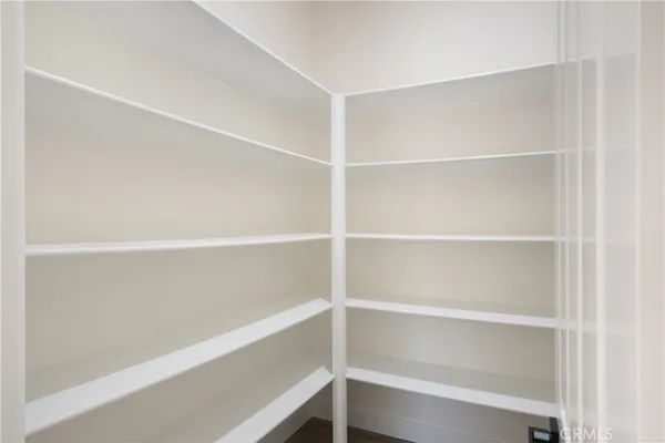 a view of a room with furniture window and wooden floor