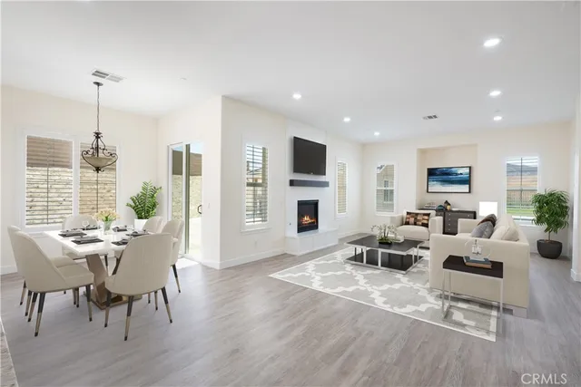 a bathroom with a double vanity sink a mirror and a shower