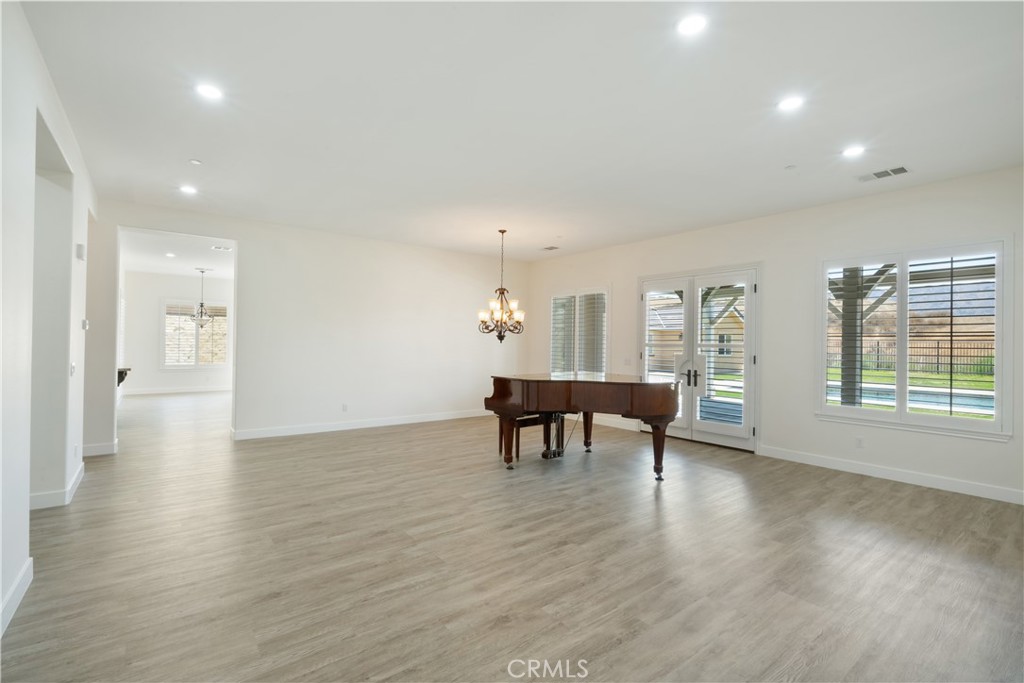 3086 Crystal Ridge Lane Colton, CA 92324 - Photo 21 of 71 a view of a livingroom with furniture window and wooden floor