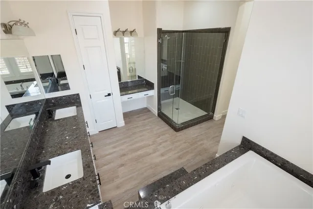 a view of swimming pool with yard in front of it