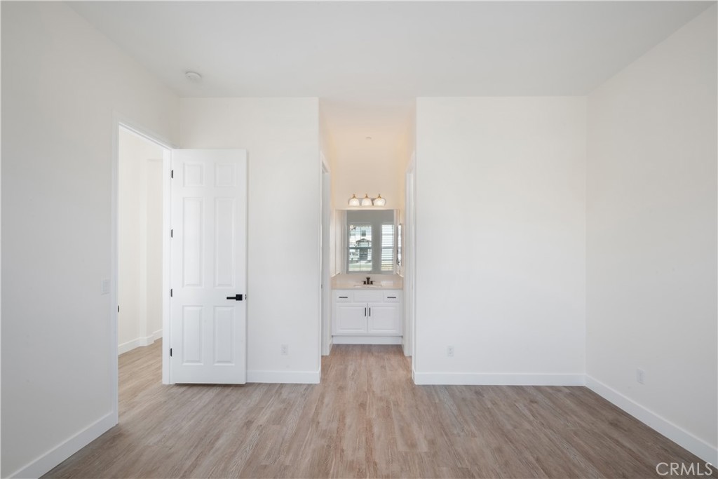 3086 Crystal Ridge Lane Colton, CA 92324 - Photo 38 of 71 wooden floor in a white room