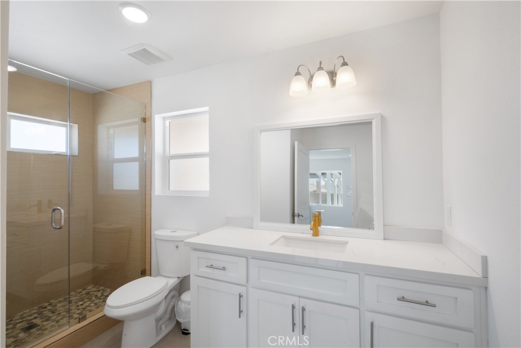3086 Crystal Ridge Lane Colton, CA 92324 - Photo 55 of 71 a bathroom with a sink toilet and shower