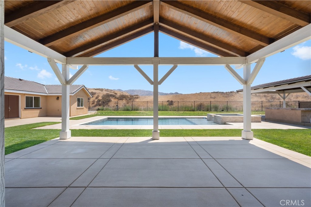 3086 Crystal Ridge Lane Colton, CA 92324 - Photo 61 of 71 a view of swimming pool with yard in front of it