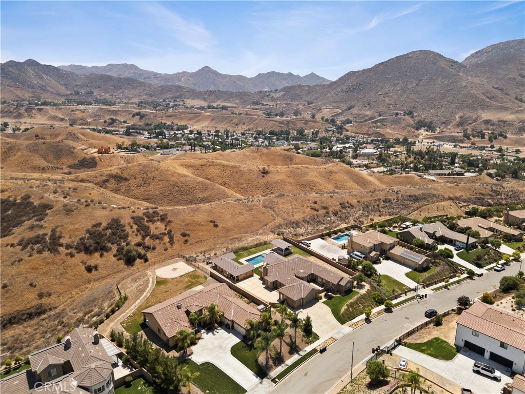 3086 Crystal Ridge Lane Colton, CA 92324 - Photo 68 of 71 an aerial view of residential house and lake view