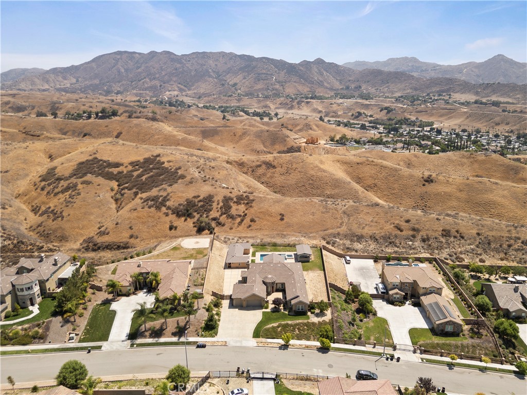 3086 Crystal Ridge Lane Colton, CA 92324 - Photo 69 of 71 Aerial view of Main House and Casita with Private Backyard