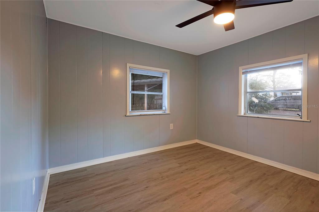 2011 East 148th Avenue Lutz, FL 33559 - Photo 16 of 37 a view of empty room with wooden floor