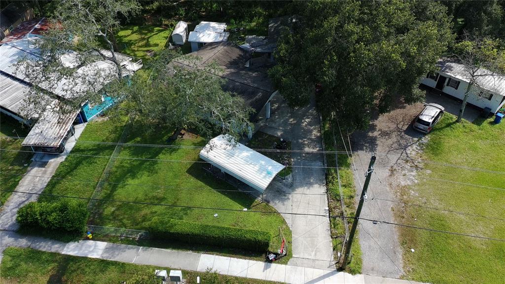 2011 East 148th Avenue Lutz, FL 33559 - Photo 37 of 37 a green field with lots of trees