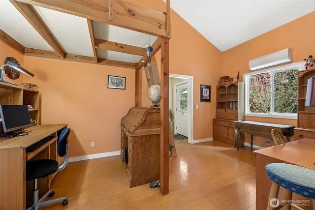 a bed room with a bed and a chandelier