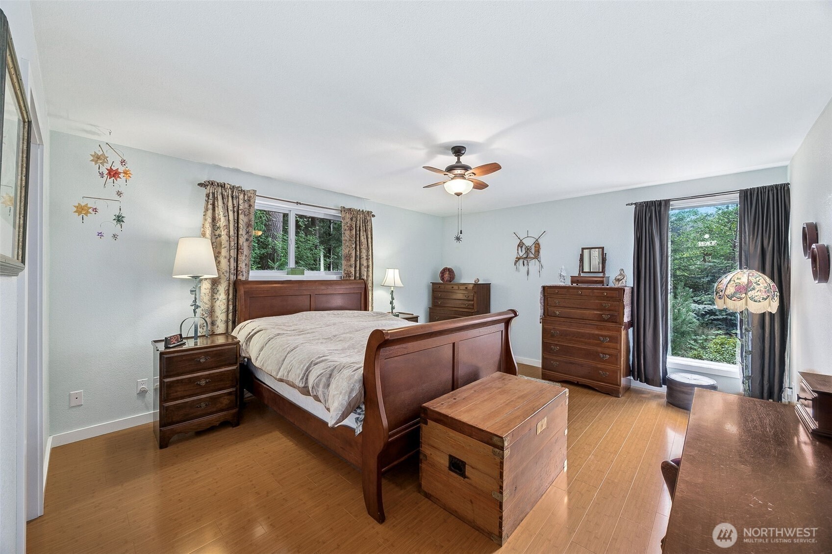 701 Mineral Hill Road Mineral, WA 98355 - Photo 21 of 40 a bed room with a bed and a chandelier