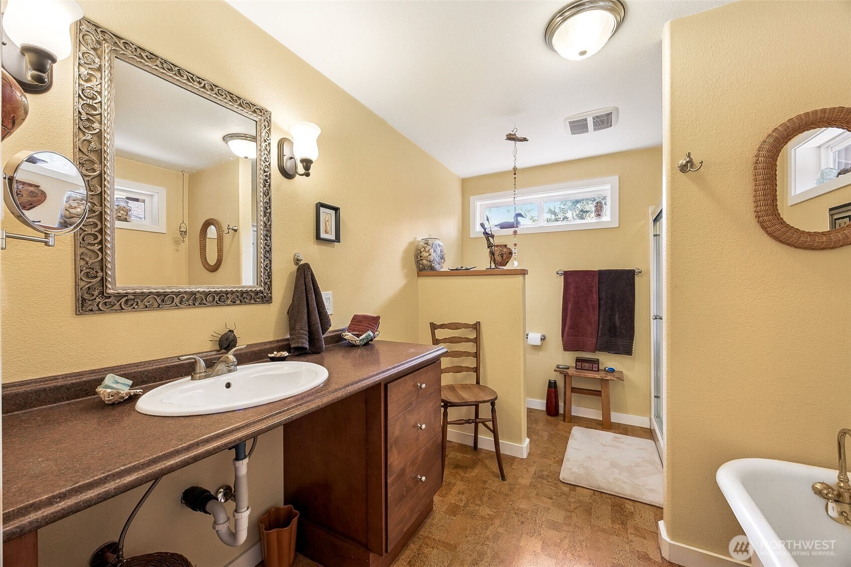 701 Mineral Hill Road Mineral, WA 98355 - Photo 23 of 40 a bathroom with a sink a mirror and a toilet