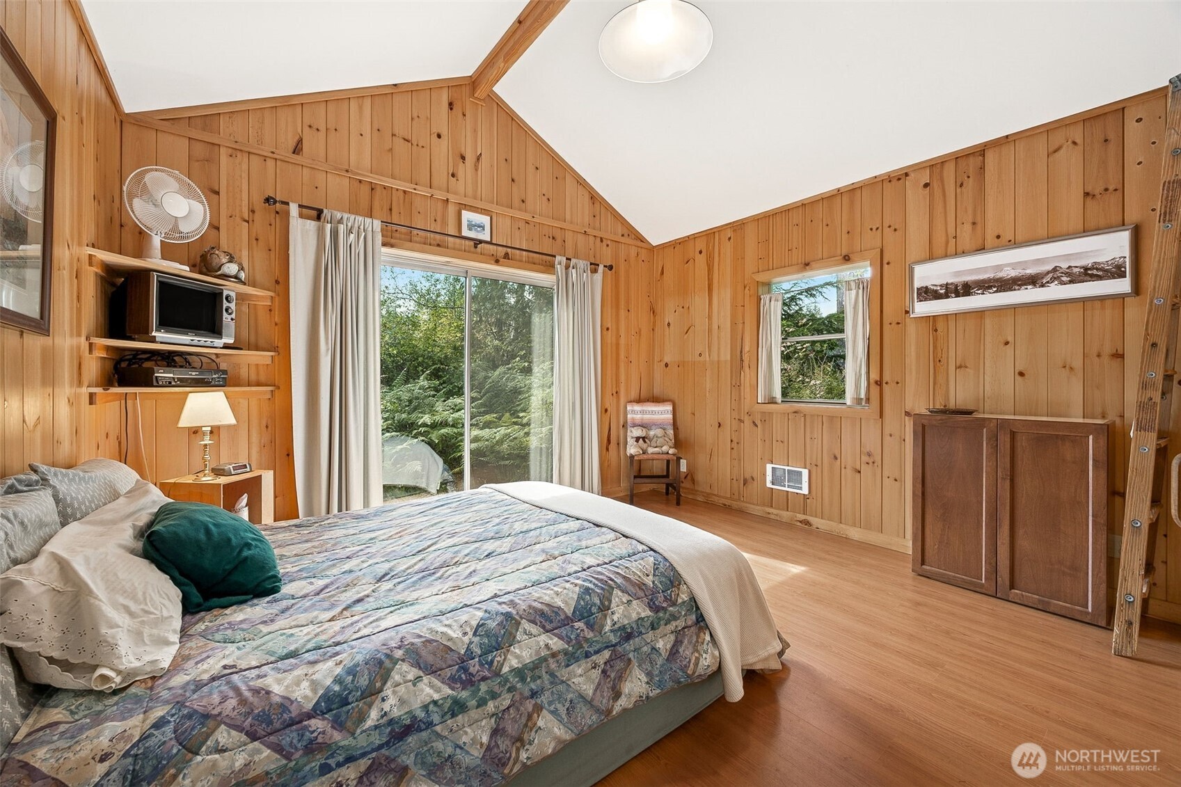 701 Mineral Hill Road Mineral, WA 98355 - Photo 28 of 40 a bedroom with a large bed and large window