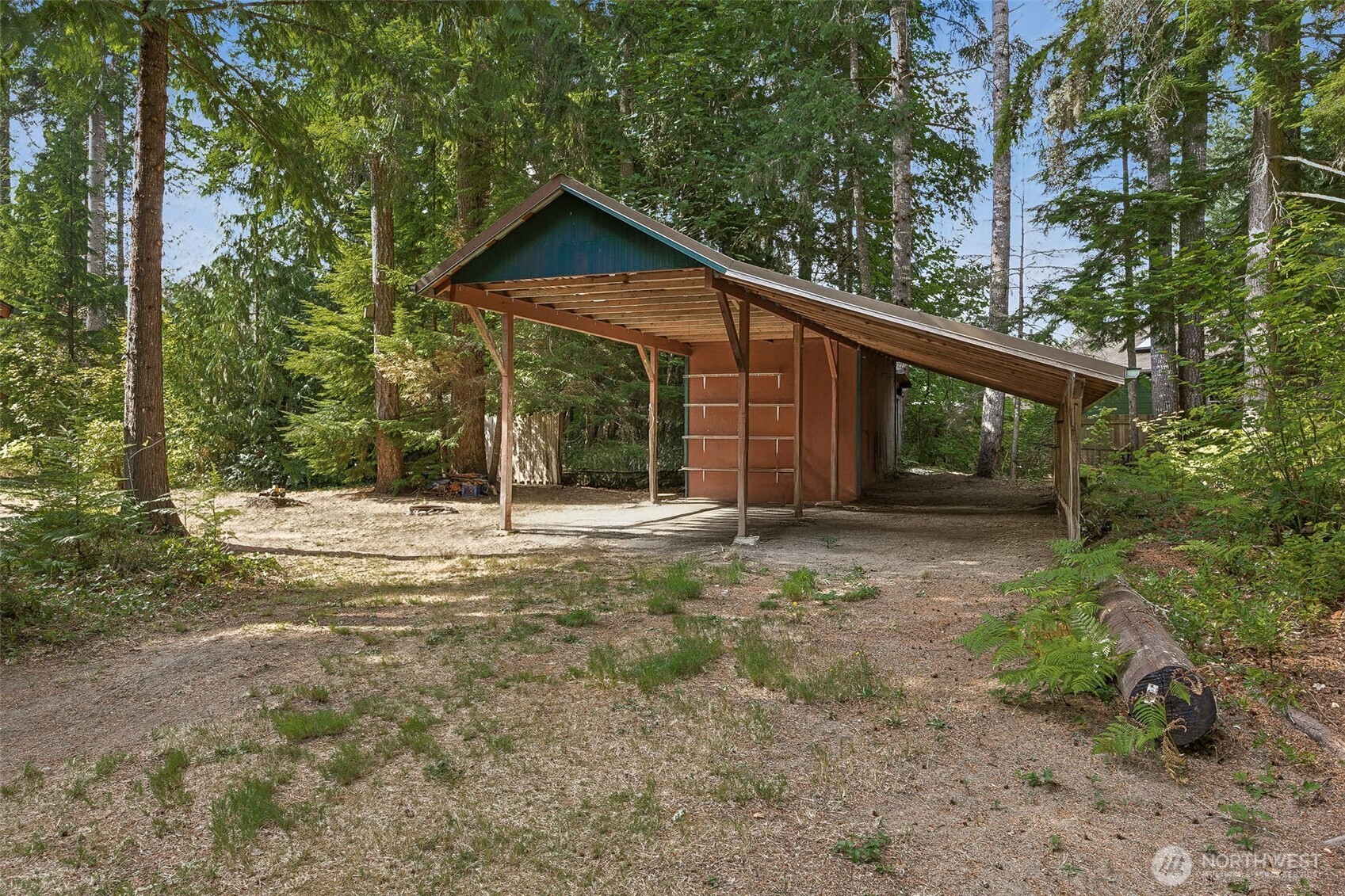 701 Mineral Hill Road Mineral, WA 98355 - Photo 4 of 40 a view of a wooden house with a yard