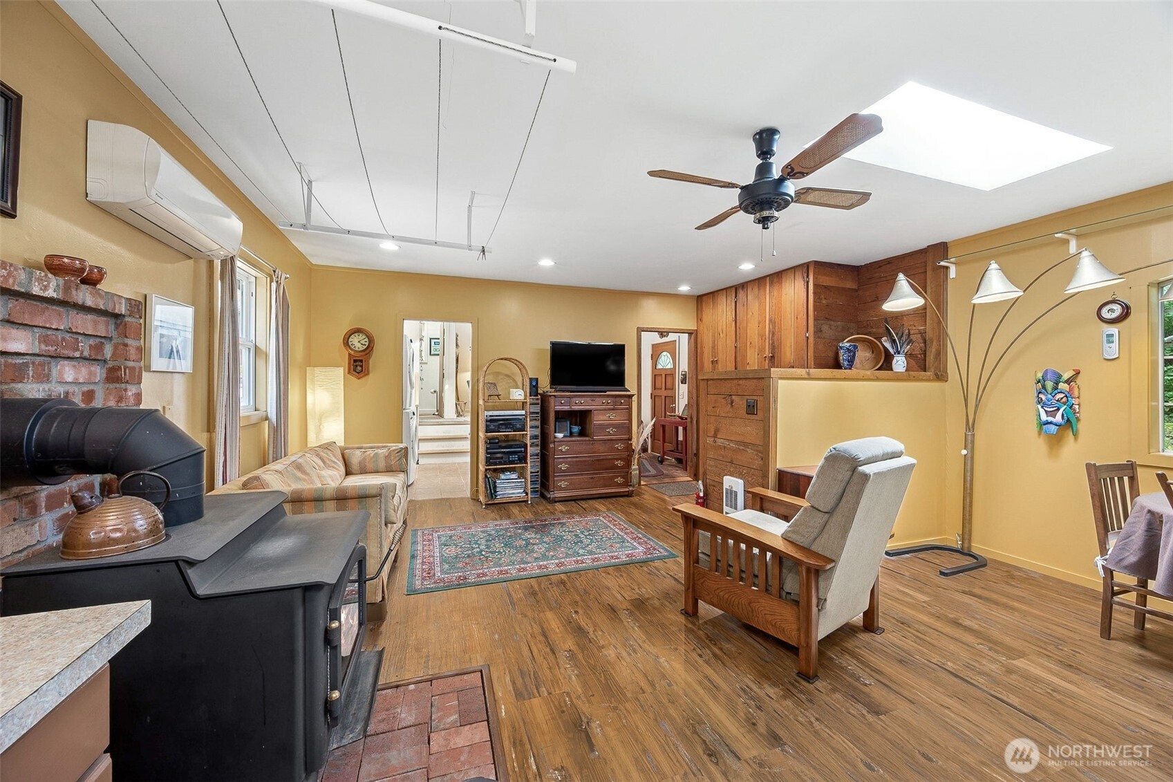 701 Mineral Hill Road Mineral, WA 98355 - Photo 7 of 40 a living room with furniture and a flat screen tv