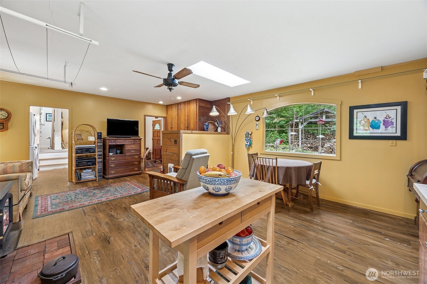 701 Mineral Hill Road Mineral, WA 98355 - Photo 10 of 40 a living room with furniture a flat screen tv and kitchen view