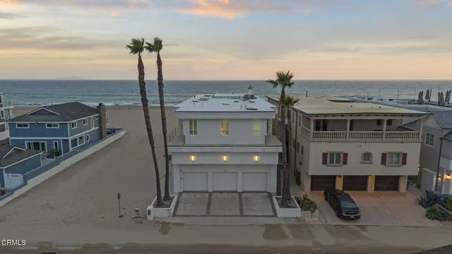 a front view of a building with parking space