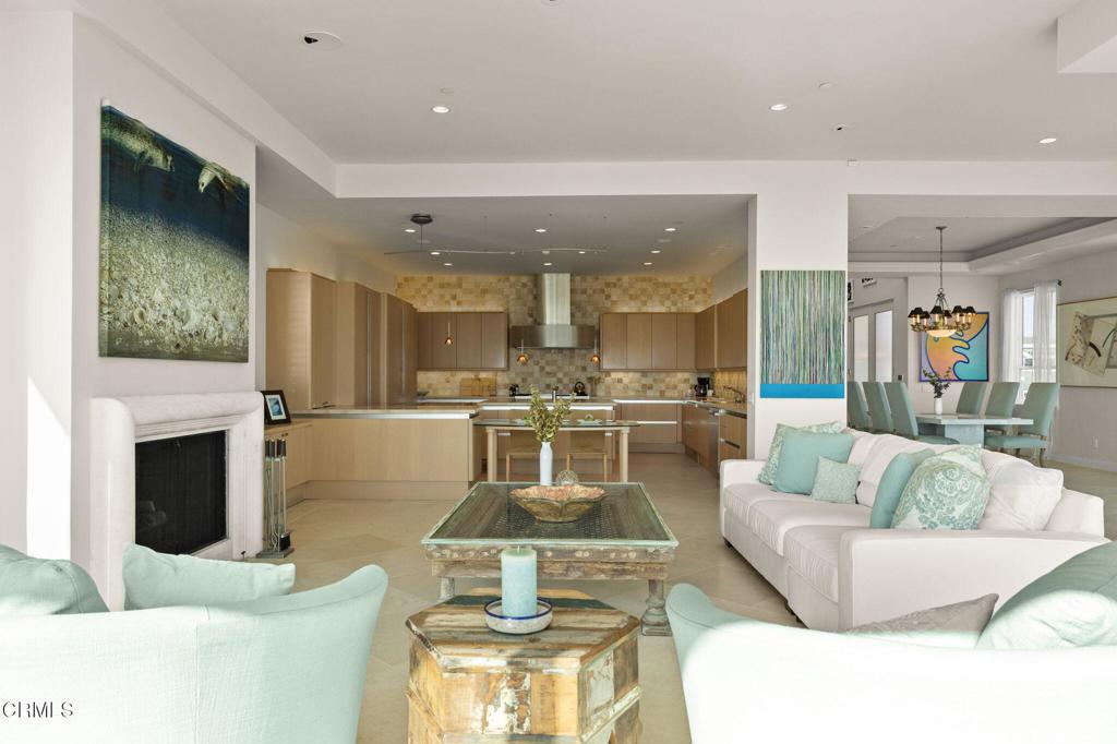 1135 Capri Way Oxnard, CA 93035 - Photo 13 of 62 a living room with furniture and a fireplace