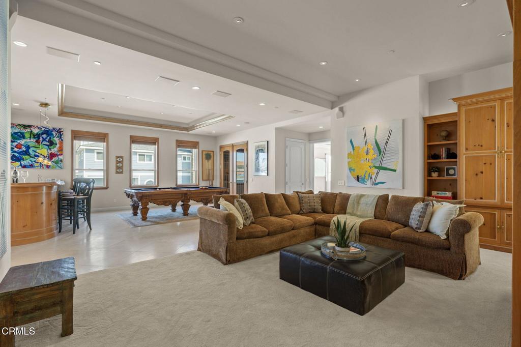 1135 Capri Way Oxnard, CA 93035 - Photo 19 of 62 a living room with furniture and a large window