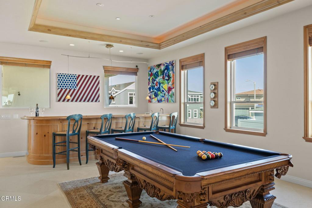 1135 Capri Way Oxnard, CA 93035 - Photo 21 of 62 a room with furniture pool table and windows