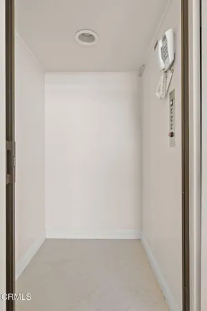 a large bedroom with a large bed and a couch