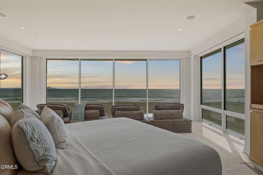 1135 Capri Way Oxnard, CA 93035 - Photo 30 of 62 a bedroom with furniture and a large window