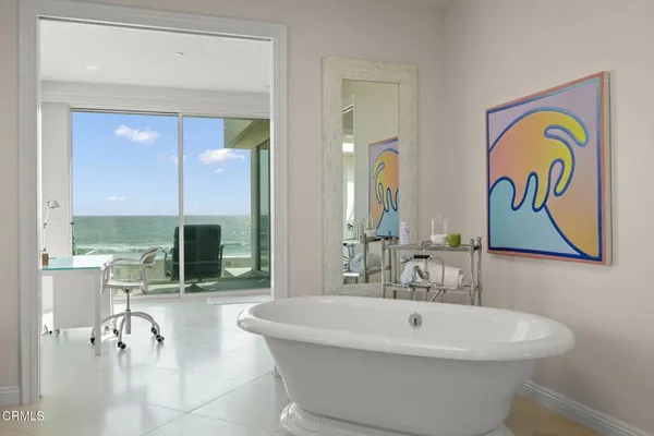 a view of living room with furniture and flat screen tv