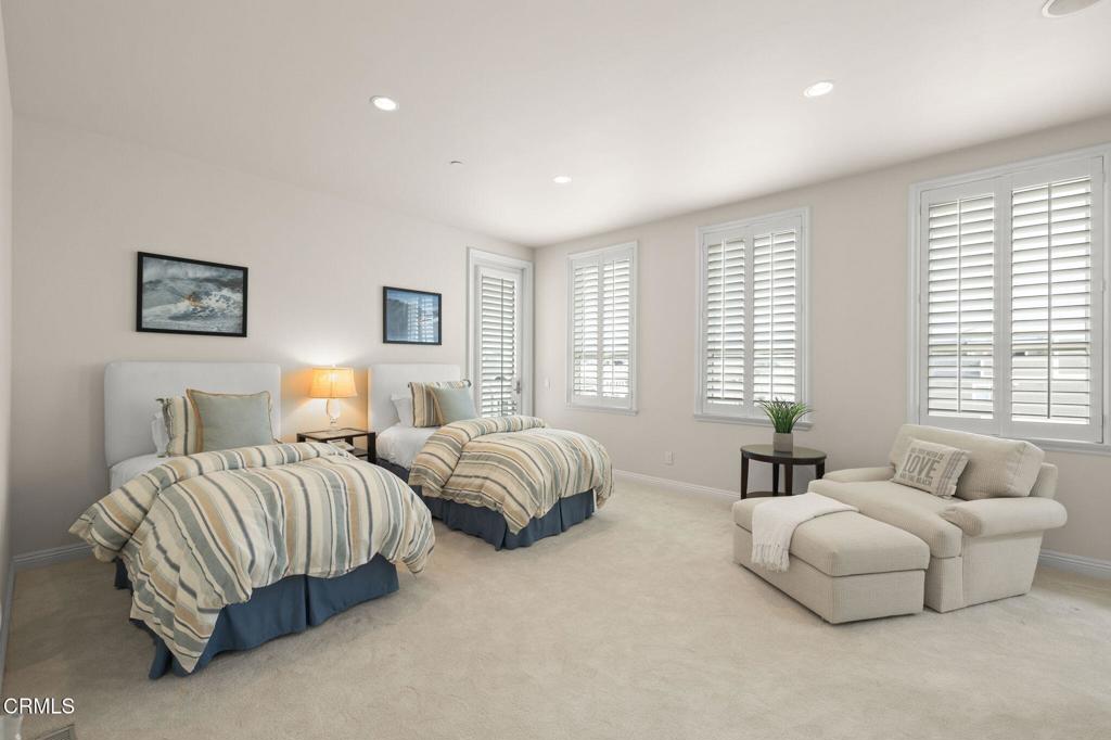 1135 Capri Way Oxnard, CA 93035 - Photo 47 of 62 a spacious bedroom with two beds and a couch