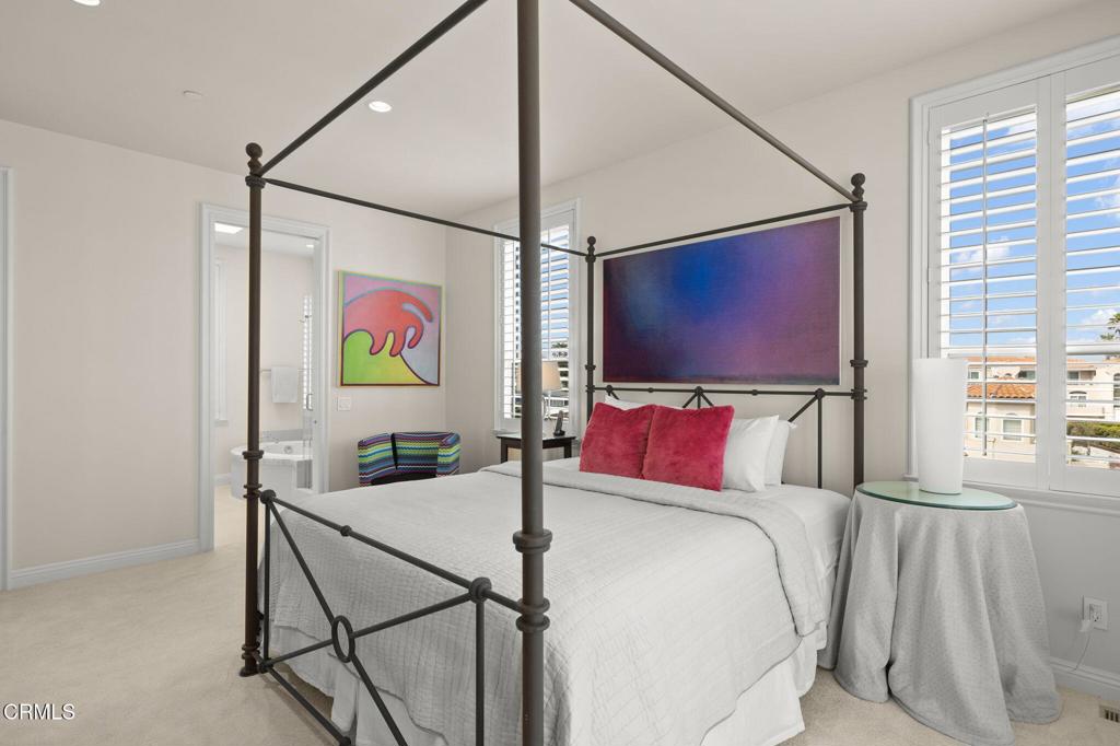 1135 Capri Way Oxnard, CA 93035 - Photo 50 of 62 a bed room with a bed and a flat screen tv