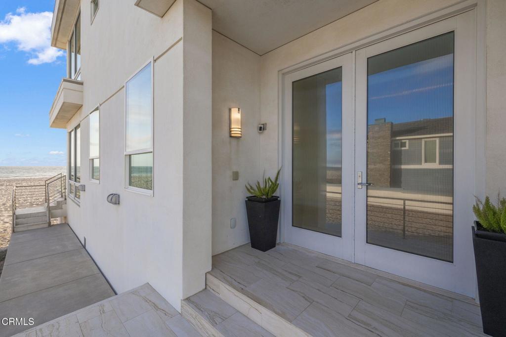 1135 Capri Way Oxnard, CA 93035 - Photo 5 of 62 a view of a hallway with wooden floor and entryway