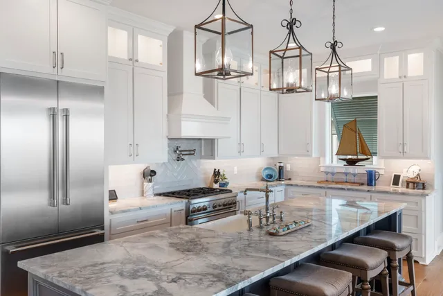 a bedroom with a bed and painting on the wall