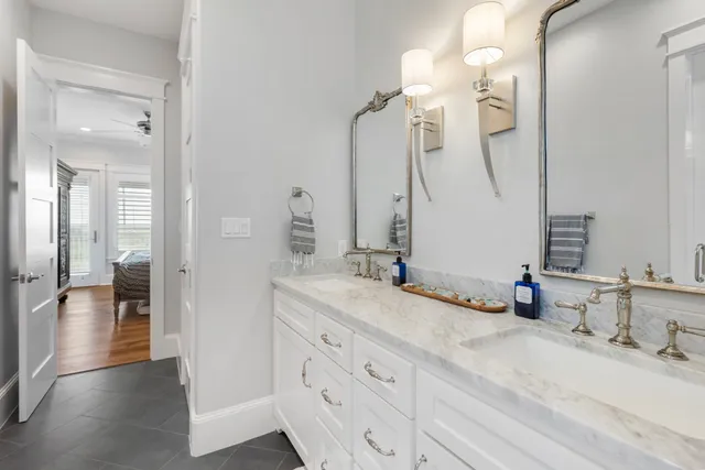 a bed room with a bed and a window