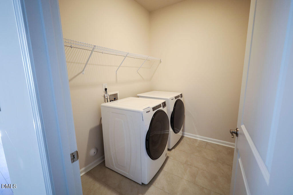 1644 Abberly Place Graham, NC 27253 - Photo 18 of 33 a utility room with dryer and washer