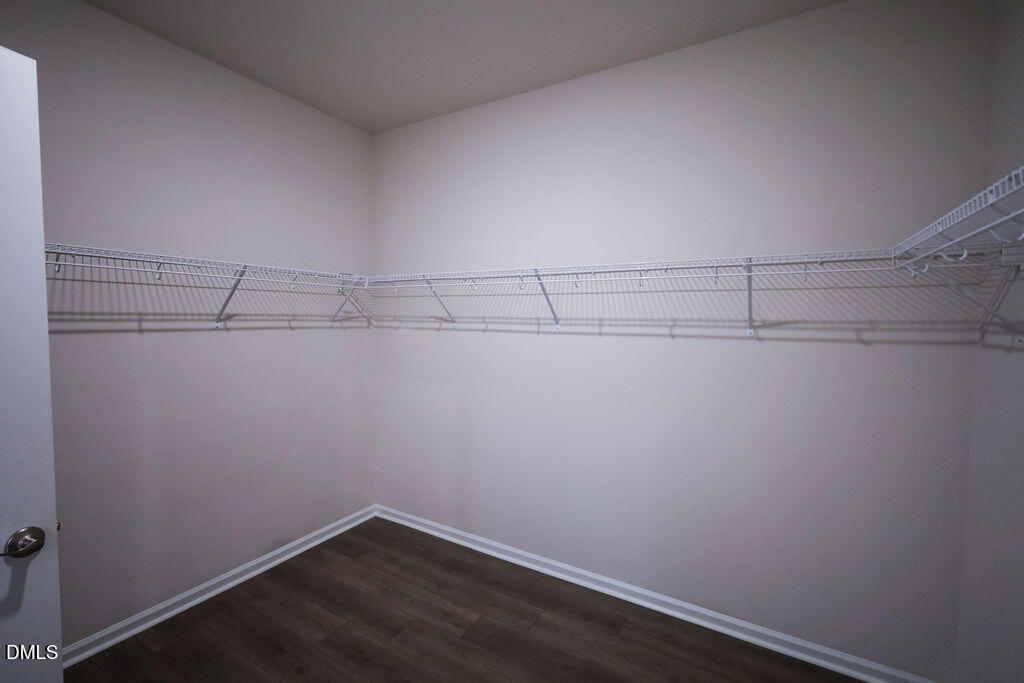 1644 Abberly Place Graham, NC 27253 - Photo 23 of 33 a view of a room with racks on the wall