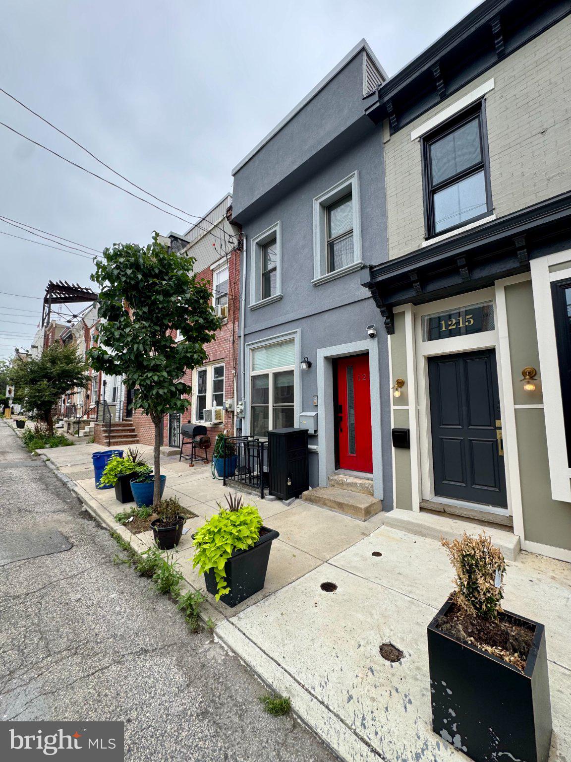 1217 LeCount Street Philadelphia, PA 19121 - Photo 2 of 29 Charming urban homes with vibrant doors.