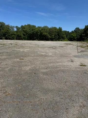 a view of an ocean beach and mountain